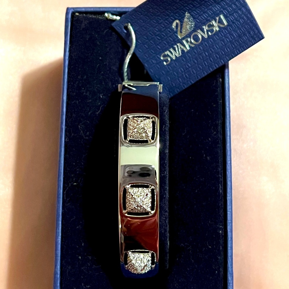 Swarovski rhodium silver color bangle.